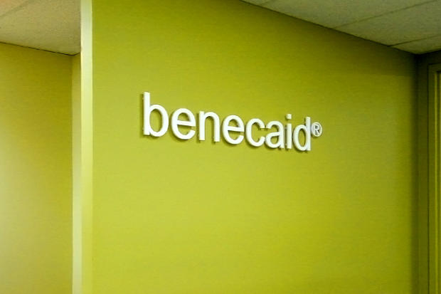 Dimensional laser cut acrylic lobby signage in business office reception area - Art Signs Company