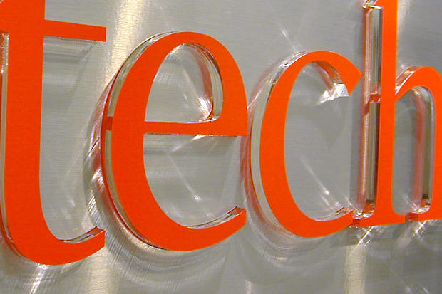 3D acrylic letters on brushed stainless steel metal lobby sign panel