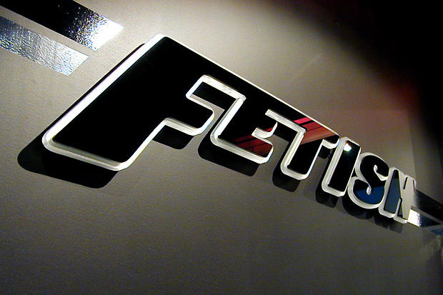 Glossy black 3D acrylic lobby sign back lit and illuminated with LEDs for light up glow effect