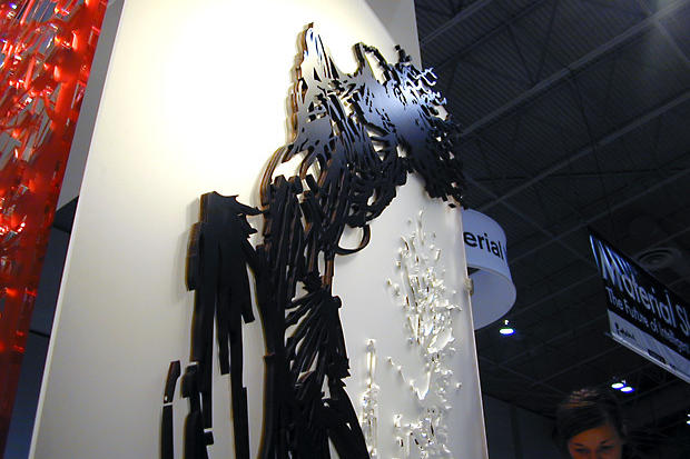 Stained wood decorative laser cut design of artistic sketch on frosted acrylic background - Art Signs Company