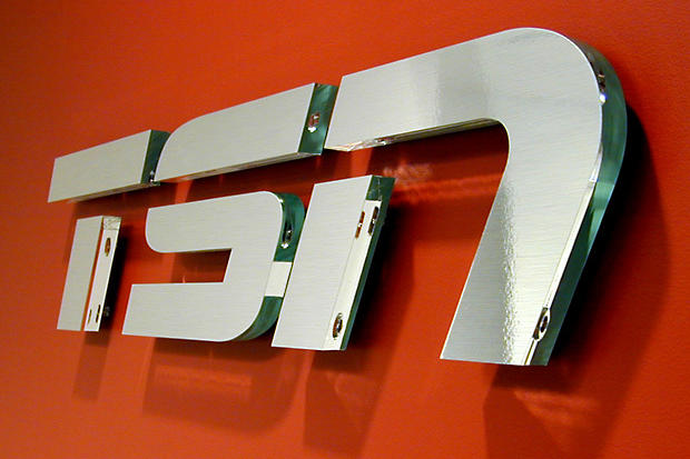 TSN Corporate Office lobby sign, laser cut metal and acrylic on business reception area wall.