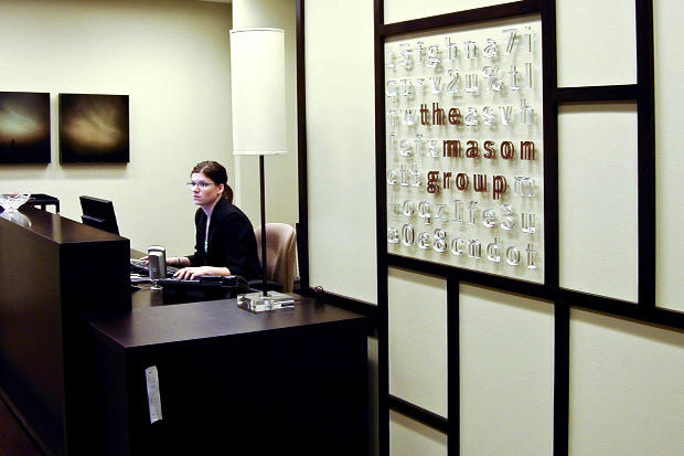 Feature lobby wall sign on interior corporate office building wall with individual raised laser cut acrylic letters - Art Signs Company