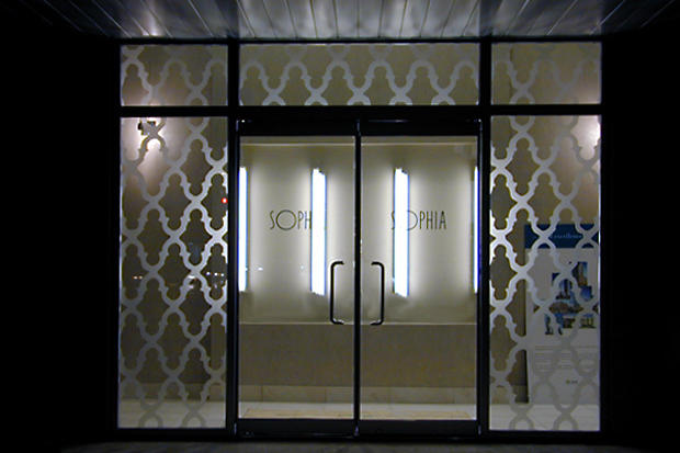 Frosted window graphics and decorative privacy screen for home and condo sales centre office windows made by Art Signs Company