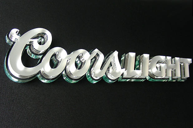 Coors Light frosted acrylic office signage lettering with large decorative wall clocks, decorative garden wall plaques, and decorative wall mirrors