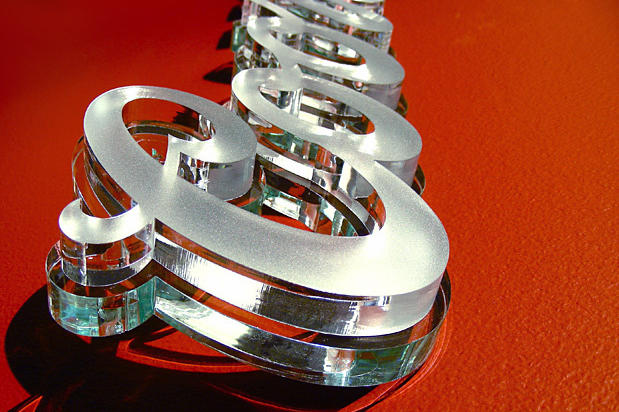 Coors Light Dimensional laser cut lobby signage letters on decorative stone wall with decorative wall hooks