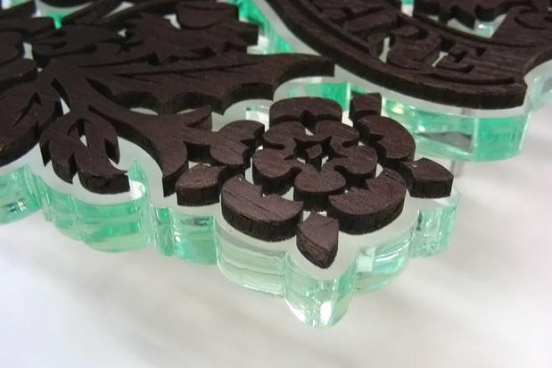 Office lobby signs made with laser cut raised wood and acrylic in reception area at porter airline toronto, porter flights toronto