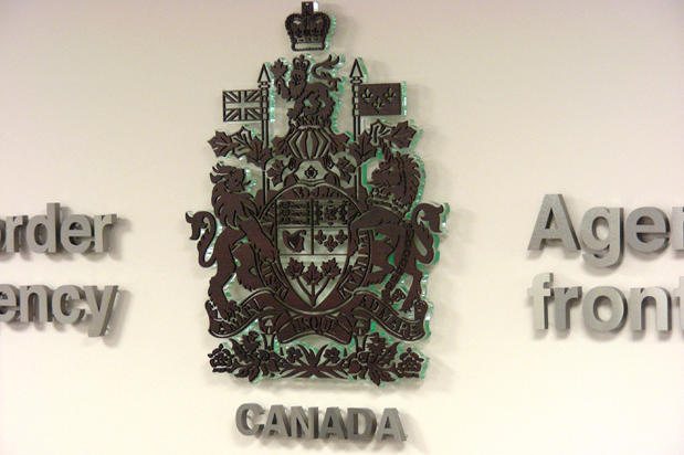 3D laser cut acrylic and wood lobby signage framing an interior wall, interior doors, boat interior, car interior custom, porter airline, porter aircraft, porters airlines, porter airlines