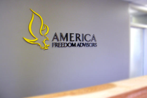3D Brushed metal corporate logo wall sign in office building lobby reception area.