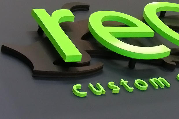 Portable custom 3D raised acrylic logo sign letters and panel for use at exhibit, trade show & conference made by Art Signs Company