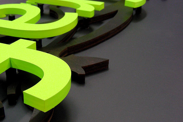 Laser cut dimensional acrylic sign letters raised off signage panel for portable conference sign made by Art Signs Company