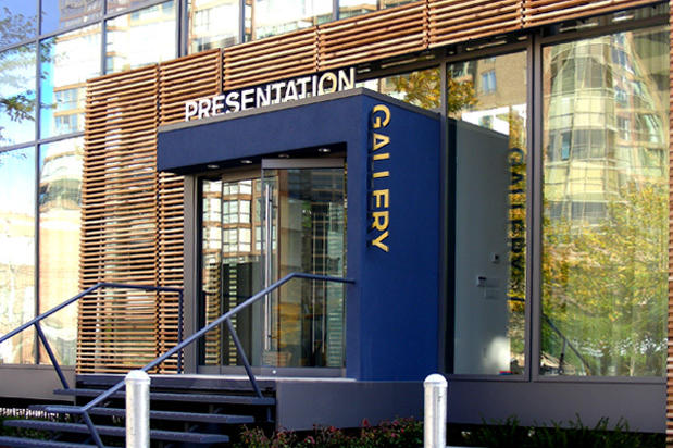 Exterior condo presentation center façade design with raised metal signage lettering made by Art Signs Company