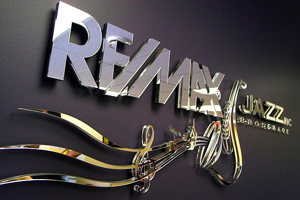 Sign office 3d corporate mirror lobby signage as decorative wall logo in reception area by Art Signs Company