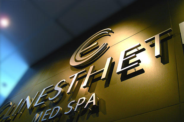 3D Office lobby sign made with brushed metal