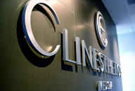 Brushed Metal office signs, installed on ceramic tiles wall