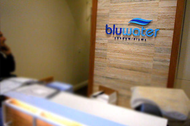 at Art Signs we proudly produce the Solution Worx - Bluewater condominiums corporate logo sign made by Art Signs in Oakville location