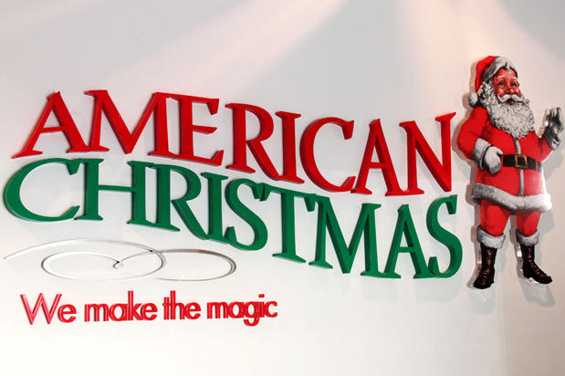 custom 3d sign made of 1 inch thick painted acrylic an CMYK printed santa