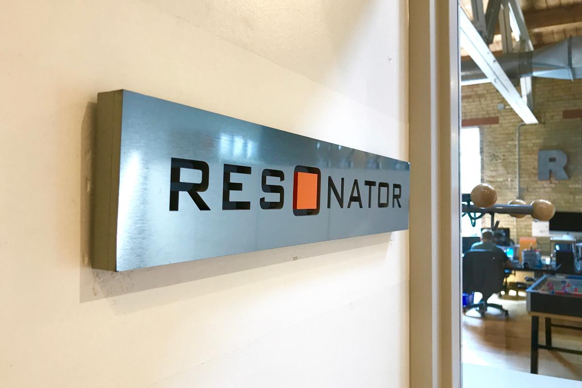 Custom acrylic office sign by door