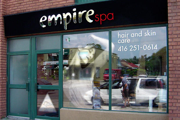 Mirror store front 3D signs and vinyl window graphics