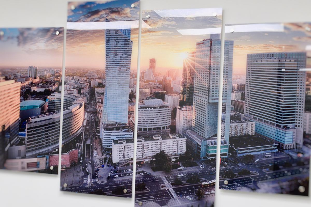 4 acrylic print panels forming downtown Warsaw landscape art in corporate office