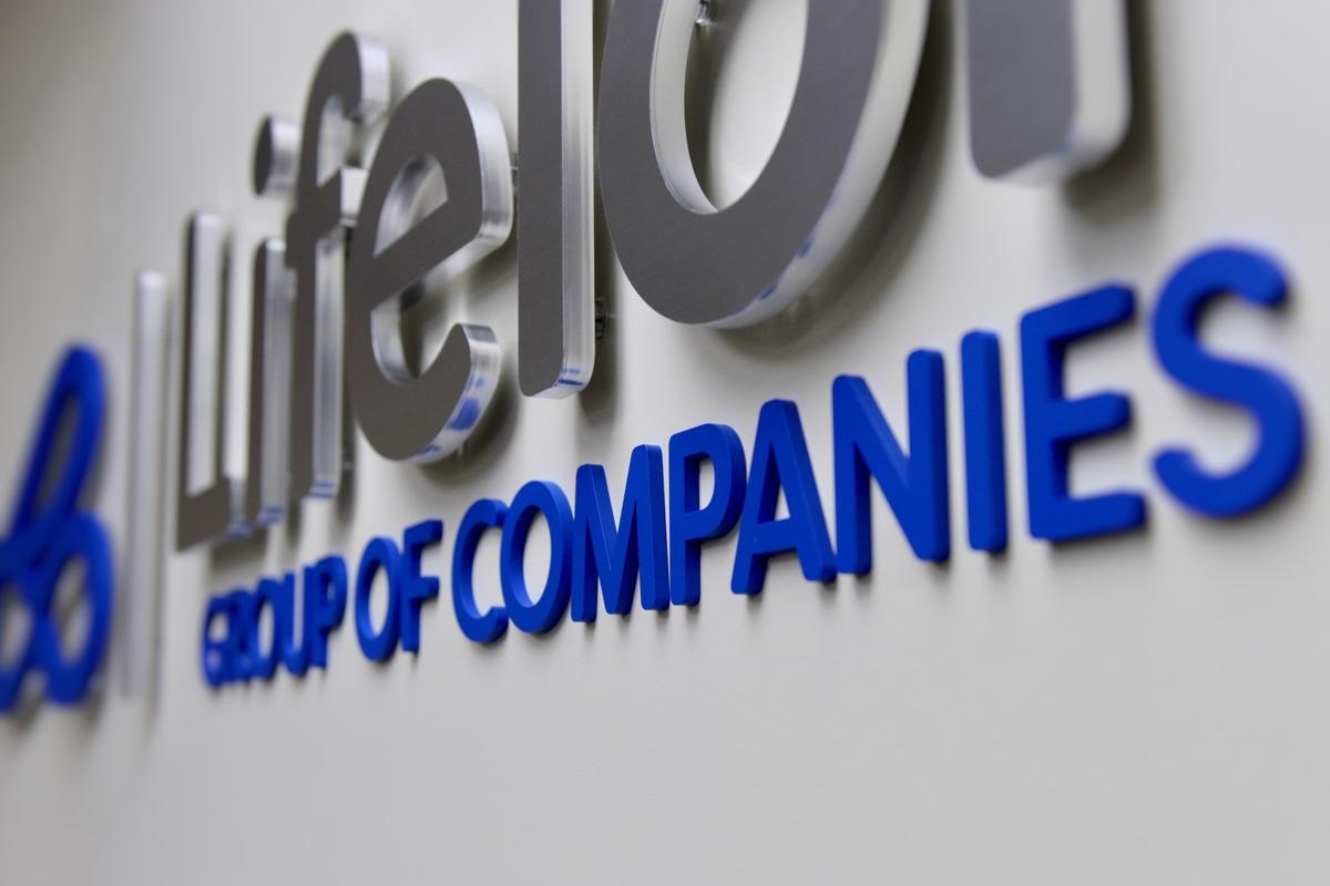 Real Estate Office Sign with Silver Metal and Blue Acrylic Letters