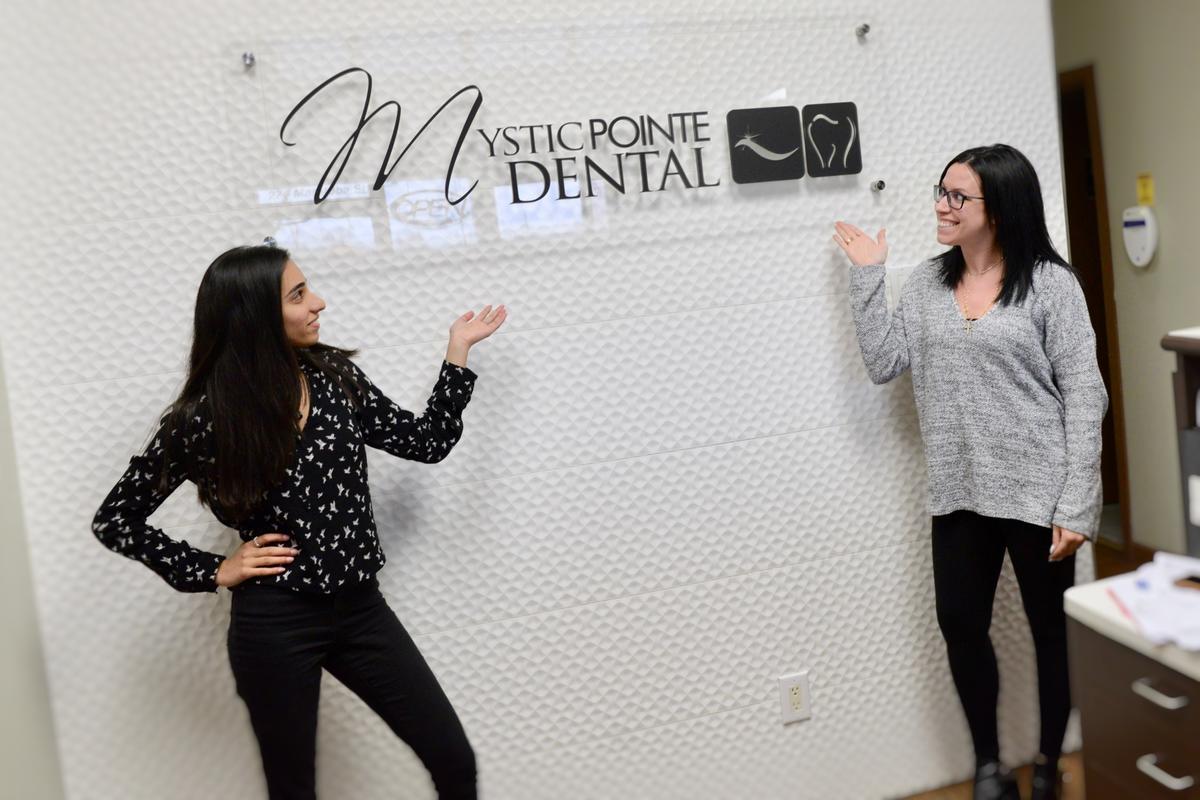 Dental Office Sign made from Acrylic Mounted on Textured Lobby Wall Tiles