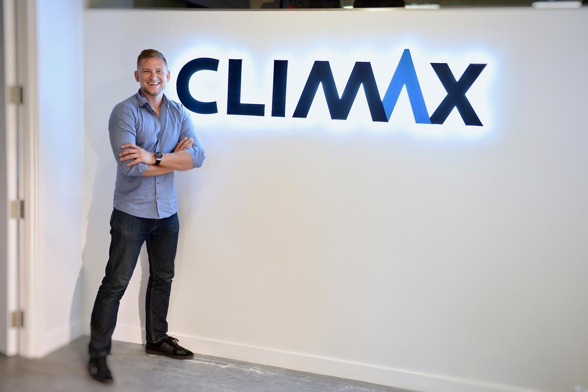 John Wilk from Climax Media with ArtSigns Backlit Acrylic Sign Letters mounted to reception area wall