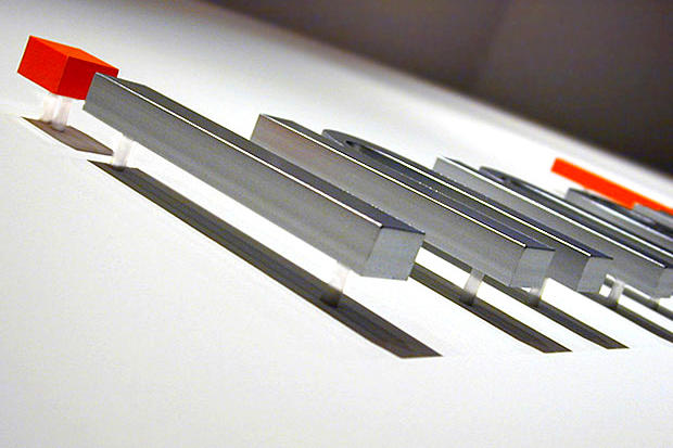 Dimensional 3D metal letters raised on lobby and reception wall.