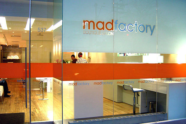 Custom frosted and orange color privacy window graphics with logo