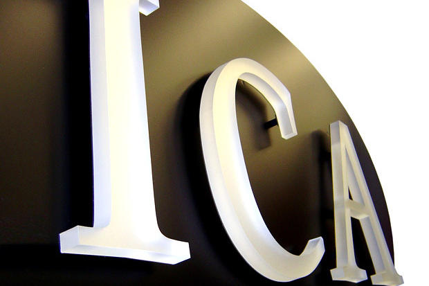 Custom office lobby sign made with laser cut dimensional acrylic letters