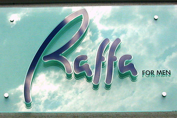 3D acrylic sign with dimensional letters and panel with stainless steel stand offs