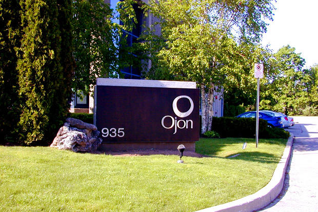 Outdoor pylon sign with dimensional metal letters