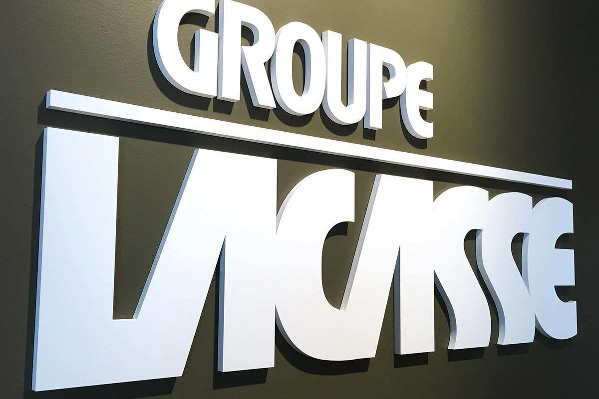 Acrylic letter sign with half inch thick letters painted to match and adhered directly to the wall.