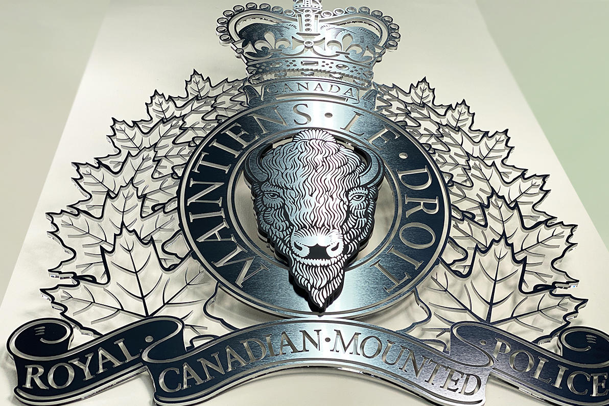 Intricately designed RCMP sign in British Columbia, featuring precision-cut metallic details, maple leaf engravings, and a bold emblem of a bison. Crafted in Canada with expert craftsmanship to reflect the strength and tradition of the Royal Canadian Mounted Police.