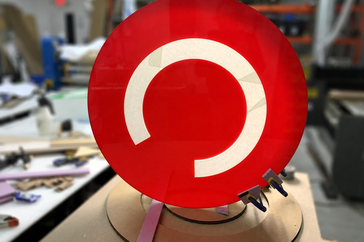 Red CTV C formed acrylic sign during fabrication