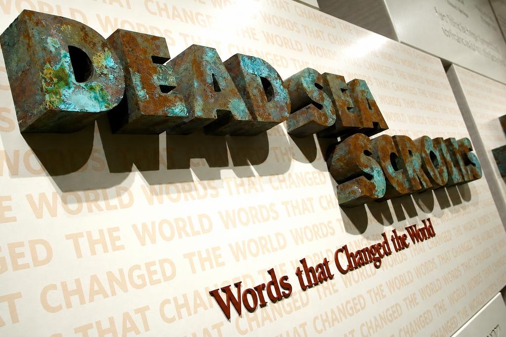 Dead Sea Scrolls foam letters with rust and copper patina above Words that Changed the World, Royal Ontario Museum Toronto.