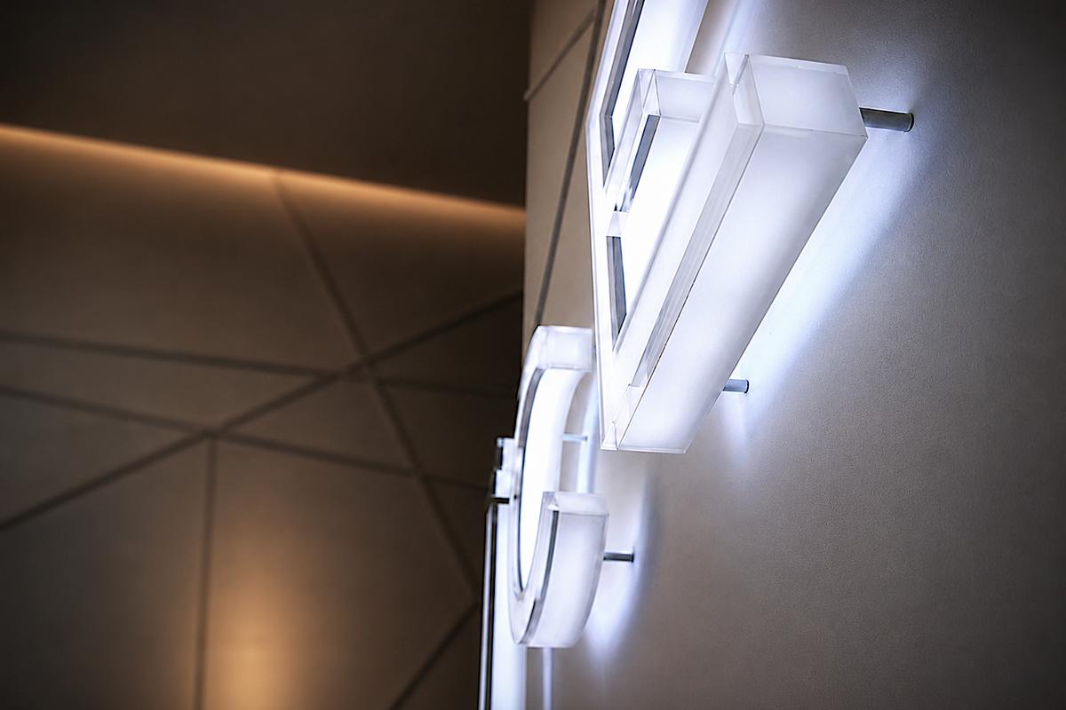 Close-up of a 2-inch-deep ICE Condominiums acrylic letter with internal LED illumination and glowing face and returns.